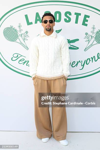 Arthur Fils attends the Lacoste Womenswear Spring/Summer 2026 show as part of Paris Fashion Week on October 05, 2025 in Paris, France.