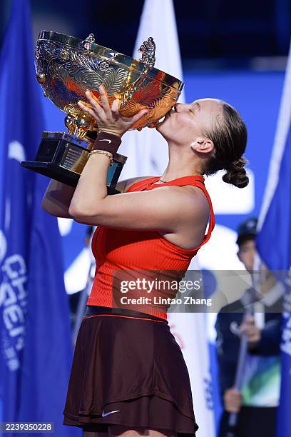 Amanda Anisimova of the United States poses with her winner's trophy during medal ceremony after winning the Women's Singles Final match against...