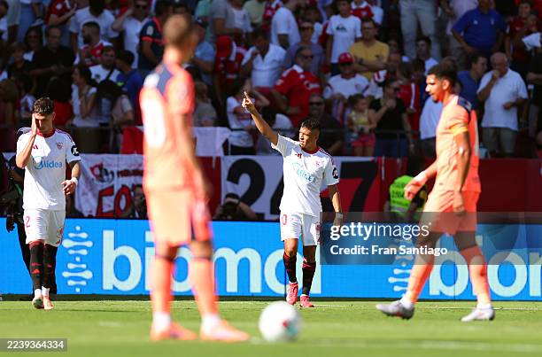 Alexis Sanchez of Sevilla FC celebrates scoring his team's first goal during the LaLiga EA Sports match between Sevilla FC and FC Barcelona at...