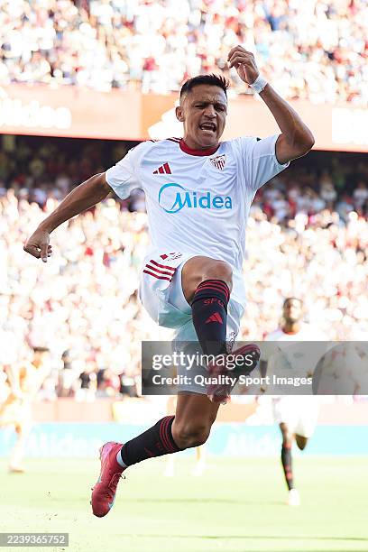 Alexis Sanchez of Sevilla FC celebrates scoring his team’s first goal from the penalty spot during the LaLiga EA Sports match between Sevilla FC and...