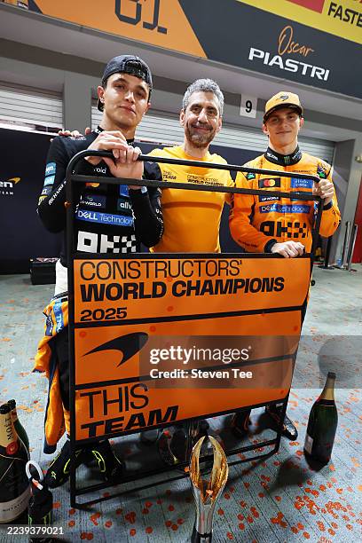 Lando Norris of Great Britain and McLaren Andrea Stella, Team Principal of McLaren and Oscar Piastri of Australia and McLaren celebrate after winning...