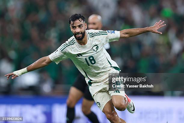 Saleh Aboulshamat of Saudi Arabia celebrates after scoring the 1st goal during the AFC Asian qualifiers 4th Round Group B match between Saudi Arabia...