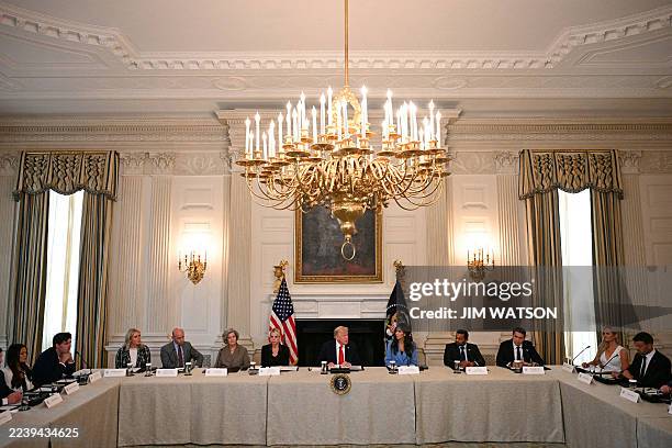 President Donald Trump chairs a roundtable about Antifa in the State Dining Room of the White House in Washington, DC, on October 8, 2025.