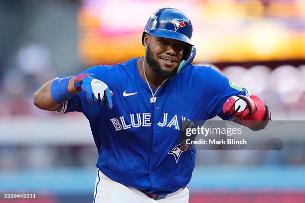 Vladimir Guerrero Jr. #27 of the Toronto Blue Jays celebrates after a grand slam during the fourth inning in game two of the American League Division...