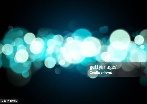 glittering abstract blue christmas lights - string lights on black stock illustrations