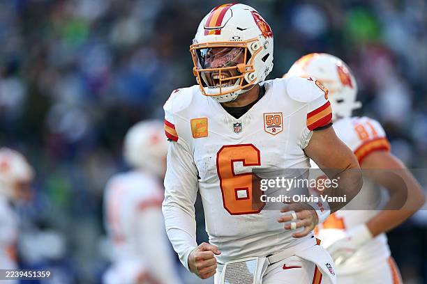 Baker Mayfield of the Tampa Bay Buccaneers reacts after a third quarter touchdown against the Seattle Seahawks at Lumen Field on October 05, 2025 in...