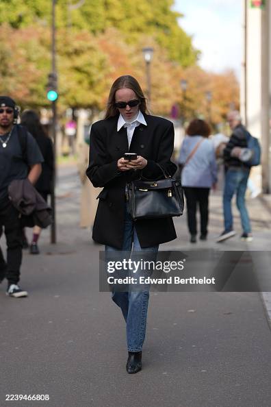 Spring Parted A guest wears long straight light brown hair parted in the center ...