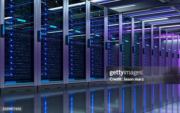 server room network server racks in a well-lit data center - centro de datos fotografías e imágenes de stock