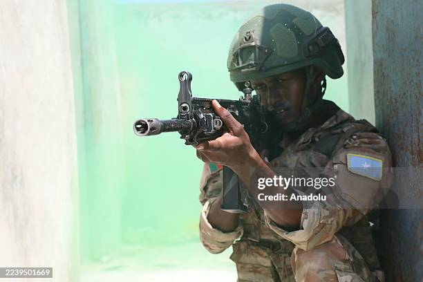 Somali soldier aims a weapon during military training at the TURKSOM Military Training Base in Mogadishu, Somalia on August 25, 2025. The Turkish...
