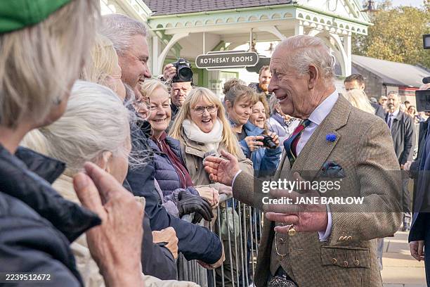 Britain's King Charles III meets wellwishers during a visit to mark the 150th anniversary of The Albert Hall in Ballater, Aberdeenshire, northeast...