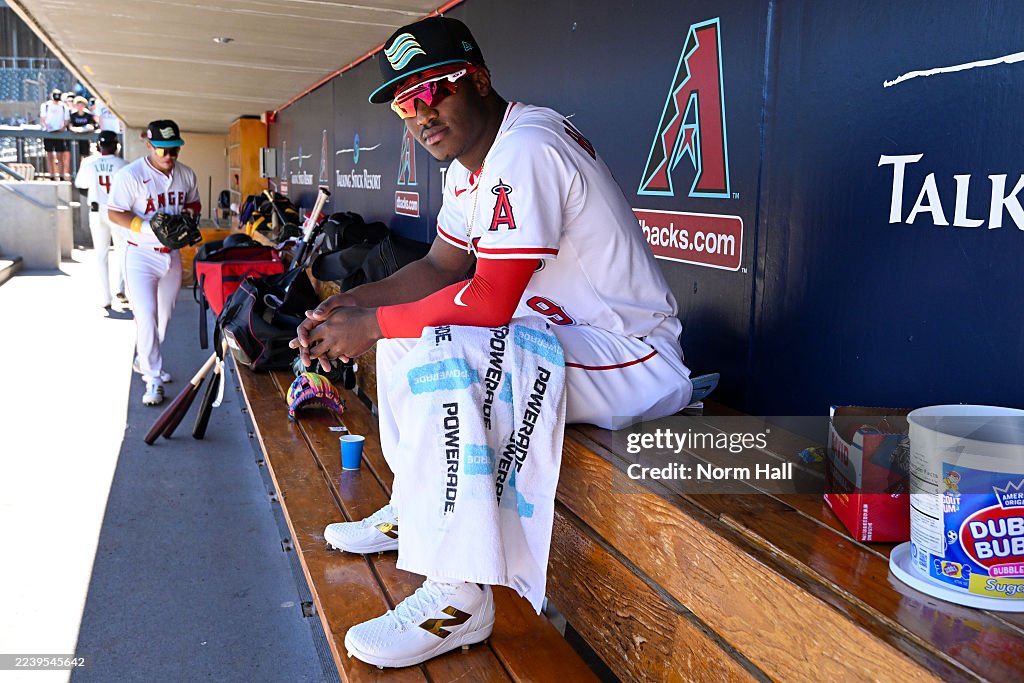 Salt River Rafters Raudi Rodriguez of the Salt River Rafters looks on in the dugout ...