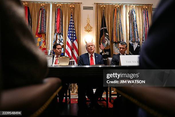 President Donald Trump speaks, alongside Secretary of State Marco Rubio and Secretary of Defense Pete Hegseth , during a cabinet meeting in the...