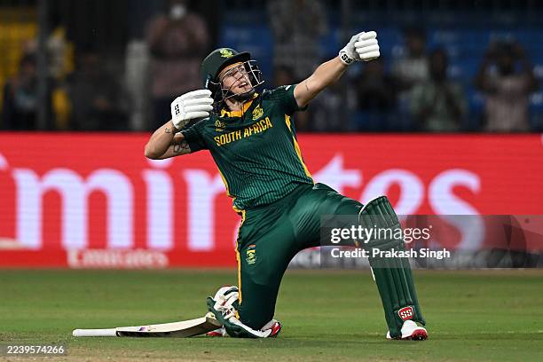Tazmin Brits of South Africa celebrates her century during the ICC Women's Cricket World Cup India 2025 match between New Zealand and South Africa at...