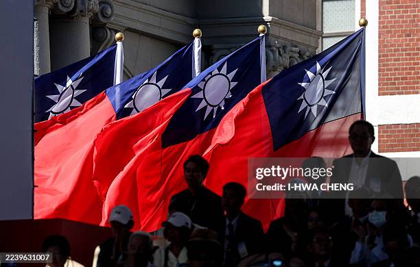 Taiwan flags are seen during National Day celebrations at the Presidential Palace in Taipei on October 10, 2025.