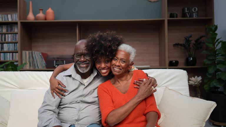 https://media.gettyimages.com/id/2239635039/video/portrait-of-family-at-home.jpg?b=1&s=640x640&k=20&c=LRz8OCH2Zza8bhmNPWV-L3IT1FlclypMeg_loHRrkDs=