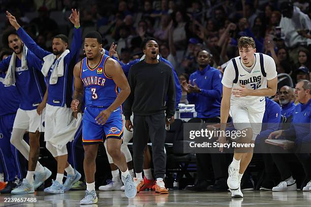 Cooper Flagg of the Dallas Mavericks reacts to a three point shot during the first half of a preseason game against the Oklahoma City Thunder at...