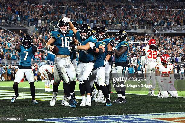 Trevor Lawrence of the Jacksonville Jaguars celebrates a touchdown against the Kansas City Chiefs during the fourth quarter at EverBank Stadium on...