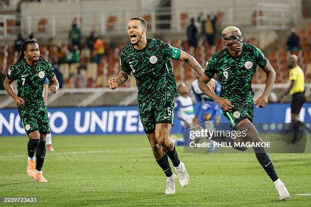 Nigeria's midfielder William Troost-Ekong celebrates scoring his team's first goal from a penalty shot during the FIFA World Cup 2026 Africa...