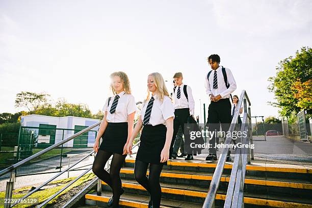 high school students wearing uniform arriving at school in the morning - newcastle upon tyne stock pictures, royalty-free photos & images