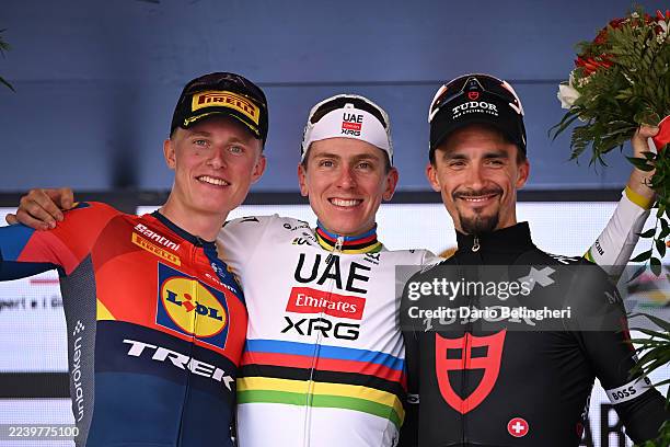 Albert Withen Philipsen of Denmark and Team Lidl - Trek on second place, race winner Tadej Pogacar of Slovenia and UAE Team Emirates and Julian...