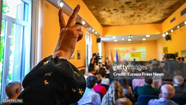 Person makes the peace symbol during an event to explain the situation in the Gaza Strip, at the Government Delegation of Cantabria, on October 7 in...