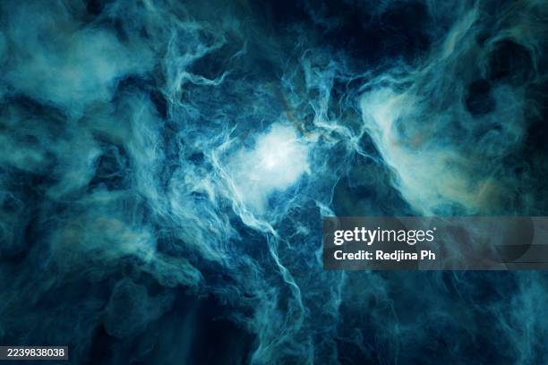 blue-white nebula energy in deep void cosmos - nebulosa imagens e fotografias de stock