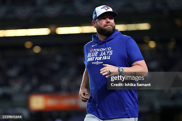 Manager John Schneider of the Toronto Blue Jays runs to the field before the game against the New York Yankees in game three of the American League...