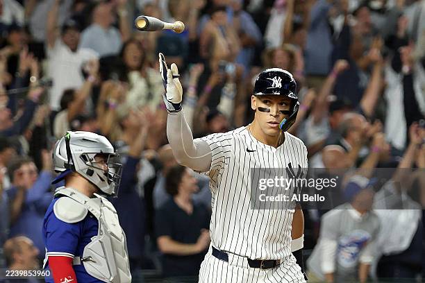Aaron Judge of the New York Yankees celebrates hitting a three-run home run against the Toronto Blue Jays during the fourth inning in game three of...