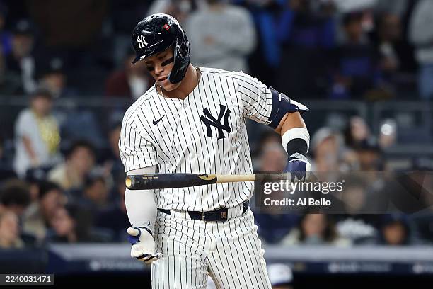 Aaron Judge of the New York Yankees reacts after striking out during the eighth inning against the Toronto Blue Jays in game four of the American...