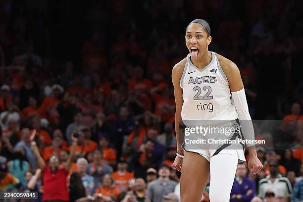 Ja Wilson of the Las Vegas Aces reacts after her made basket against the Phoenix Mercury with less than one second left in the fourth quarter of Game...