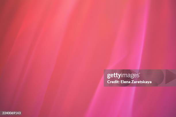 pink abstract fabric waves in soft gradient light for creative backgrounds and design projects images - lumière ambiante photos et images de collection