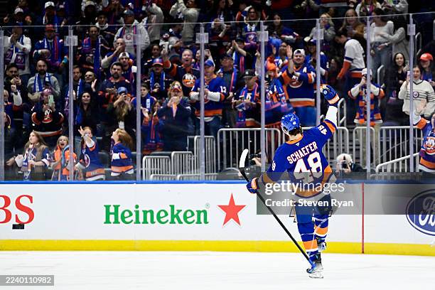 Matthew Schaefer of the New York Islanders celebrates his first NHL goal in the third period at 4:28 against the Washington Capitals at UBS Arena on...