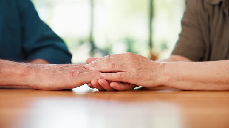 https://media.gettyimages.com/id/2240113762/video/senior-couple-support-and-holding-hands-in-home-for-empathy-comfort-and-condolences-for-loss.jpg?b=1&s=640x640&k=20&c=egJhXJb-fg3Wbo6HkAUleOlFIrfVJCJTEB-Jg5EtntY=