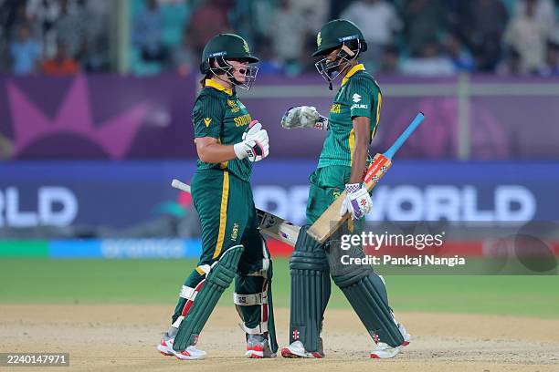 Nadine De Klerk of South Africa celebrates victory with team mate Ayabonga Khaka after hitting out for six runs to win the ICC Women's Cricket World...