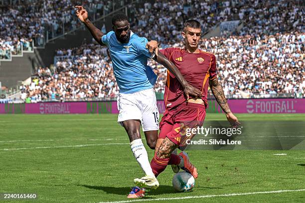 Gianluca Mancini of AS Roma fights for the ball with Boulaye Dia of SS Lazio during the Serie A match between SS Lazio and AS Roma at Stadio Olimpico...