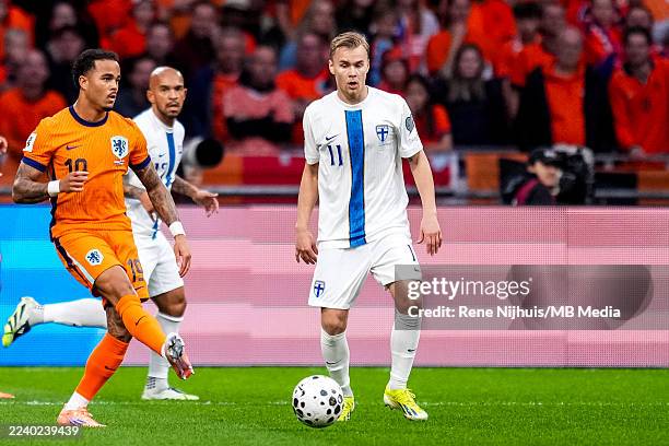 Justin Kluivert of Netherlands passes the ball during the FIFA World Cup 2026 qualifier match between Netherlands and Finland at Johan Cruijff Arena...