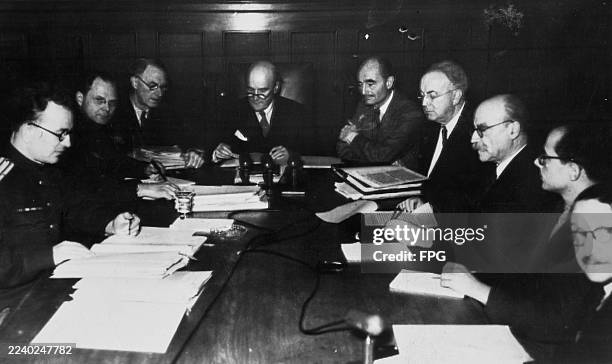 Soviet judge Lieutenant Colonel Alexander Volchkov, Soviet judge Major-General Iona Nikitchenko, British judge Norman Birkett, British judge Geoffrey...