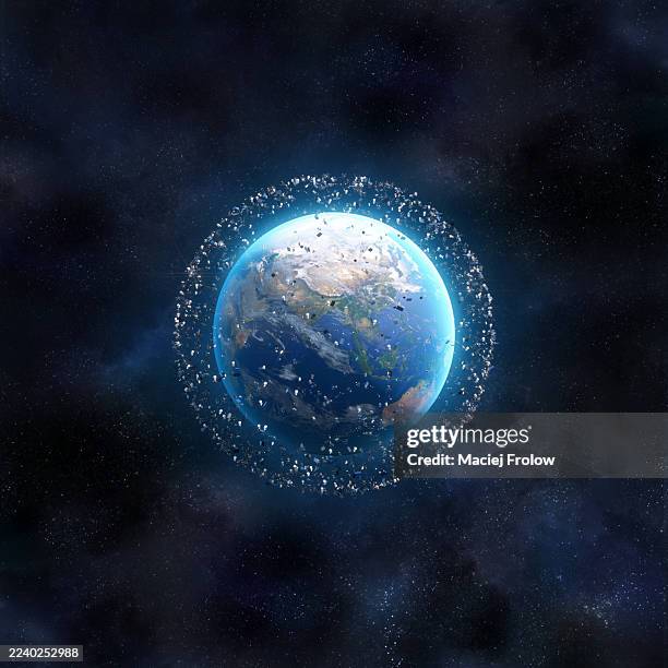 space junk orbiting around earth - falling debris stock pictures, royalty-free photos & images