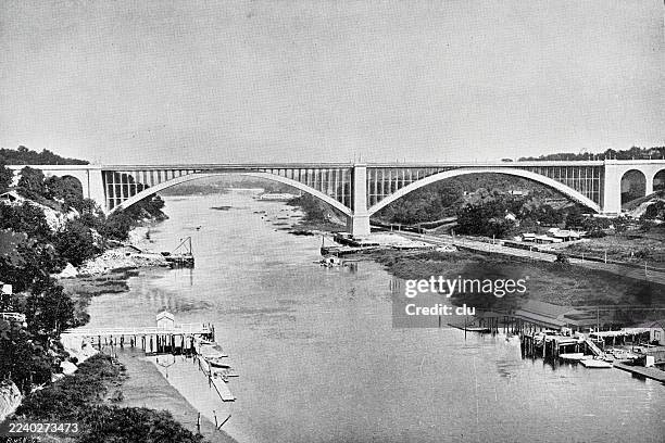 new york city, the george washington bridge, across harlem river - george washington bridge stock illustrations