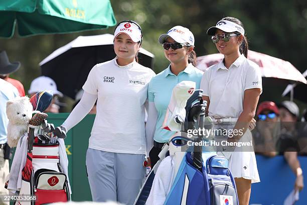 Sei Young Kim of South Korea , Hye Jin Choi of South Korea and Menghan Li of China pose for a photograph on the first hole during the third round of...