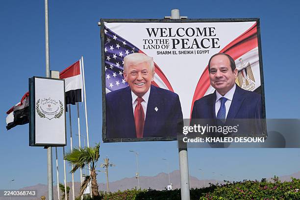 This photograph shows a billboard bearing the portraits of US President Donald Trump and Egyptian President Abdel Fattah al-Sisi outside the congress...