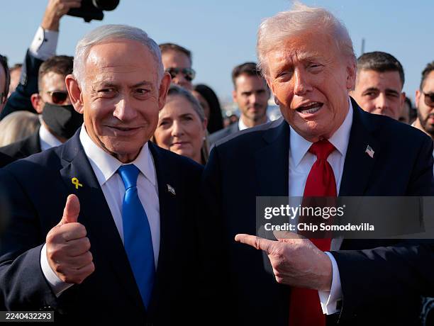 President Donald Trump speaks to Israeli Prime Minister Benjamin Netanyahu at Ben Gurion International Airport before boarding his plane to Sharm...