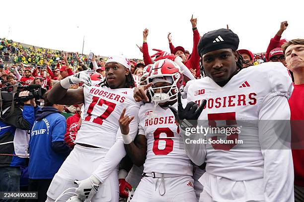 Indiana Hoosiers players and fans celebrate a 30-20 win over the Oregon Ducks at Autzen Stadium on October 11, 2025 in Eugene, Oregon.