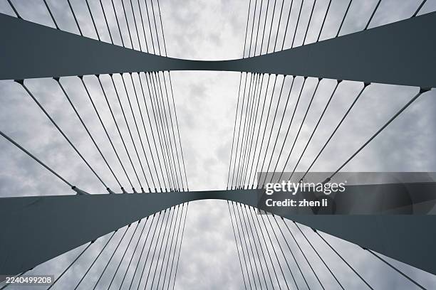 close up of urban bridge - cable stayed bridge stock pictures, royalty-free photos & images