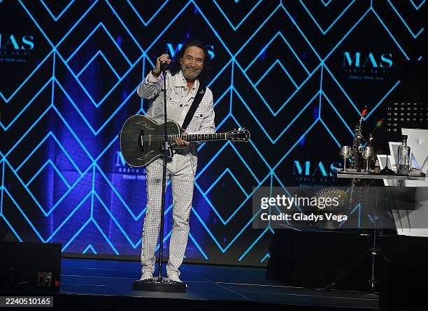 Marco Antonio Solís performs during the Más Cerca De Ti World Tour at Coliseo de Puerto Rico José Miguel Agrelot on October 11, 2025 in San Juan,...