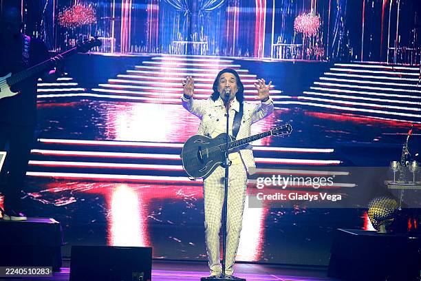 Marco Antonio Solís performs during the Más Cerca De Ti World Tour at Coliseo de Puerto Rico José Miguel Agrelot on October 11, 2025 in San Juan,...