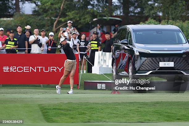 Jeeno Thitikul of Thailand hits a tee shot on the 10th hole during the final round of the Buick LPGA Shanghai 2025 at Shanghai Qizhong Garden Golf...