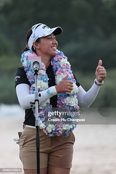 Jeeno Thitikul of Thailand reacts during the award ceremony after winning the final round of the Buick LPGA Shanghai 2025 at Shanghai Qizhong Garden...