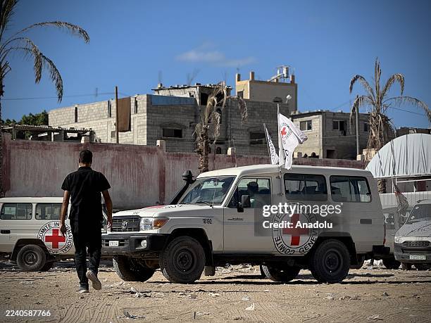 Red Cross vehicles en route to retrieve bodies of Palestinians held by Israel to Gaza authorities for identification at Nasser Hospital following the...