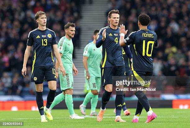 Che Adams of Scotland celebrates with Scott McTominay after scoring his team's first goal during the FIFA World Cup 2026 qualifier match between...